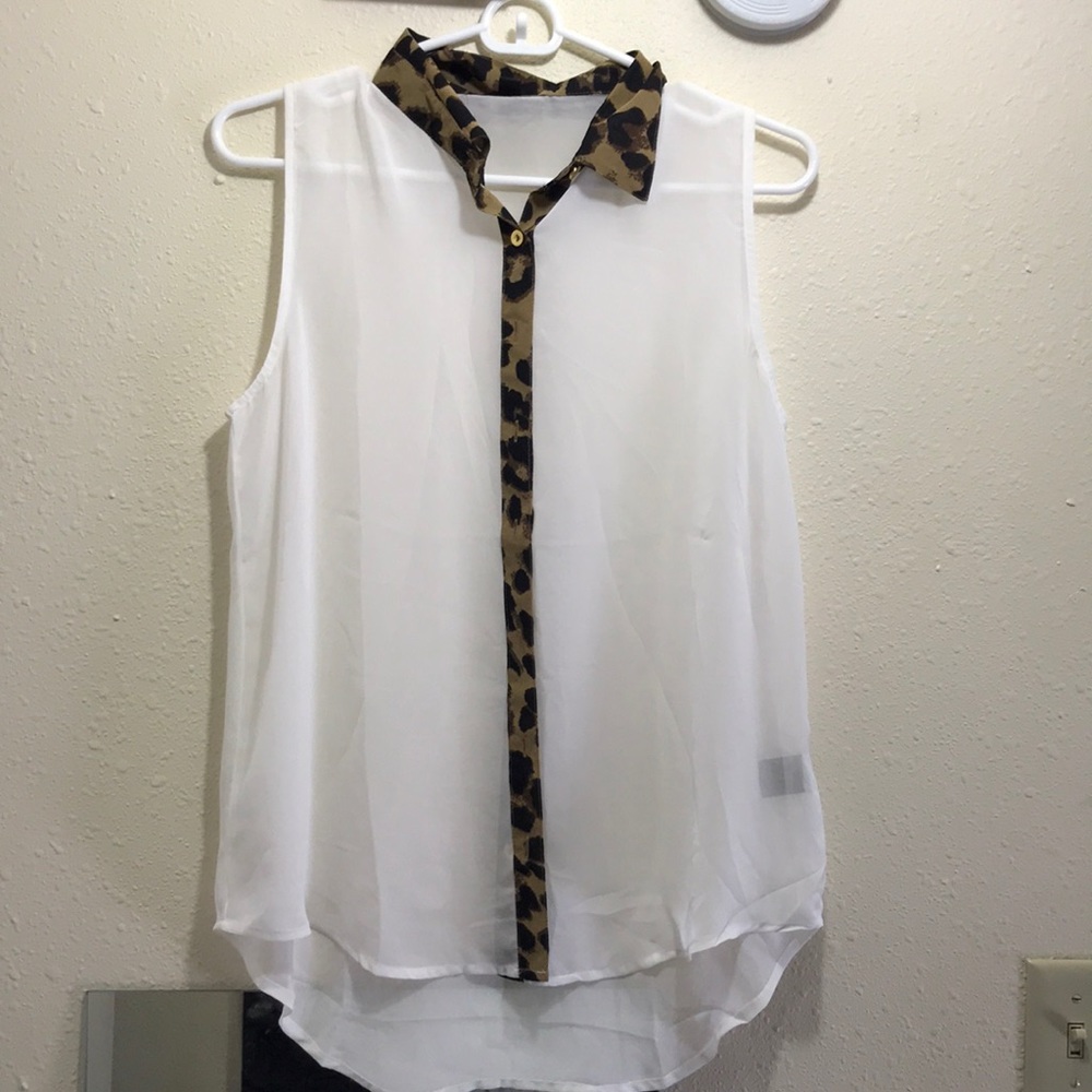 White sleeveless button-up blouse